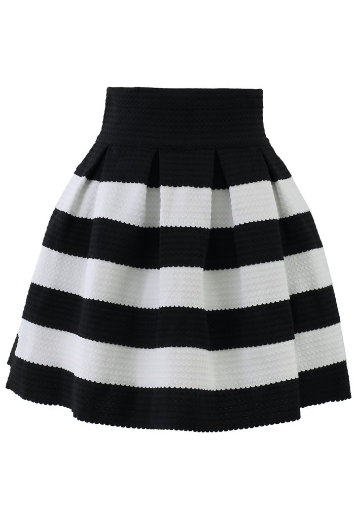 Front view of a contrast stripes A-line skirt featuring bold black and white horizontal stripes with a textured fabric and pleated design, offering a chic and modern vibe.