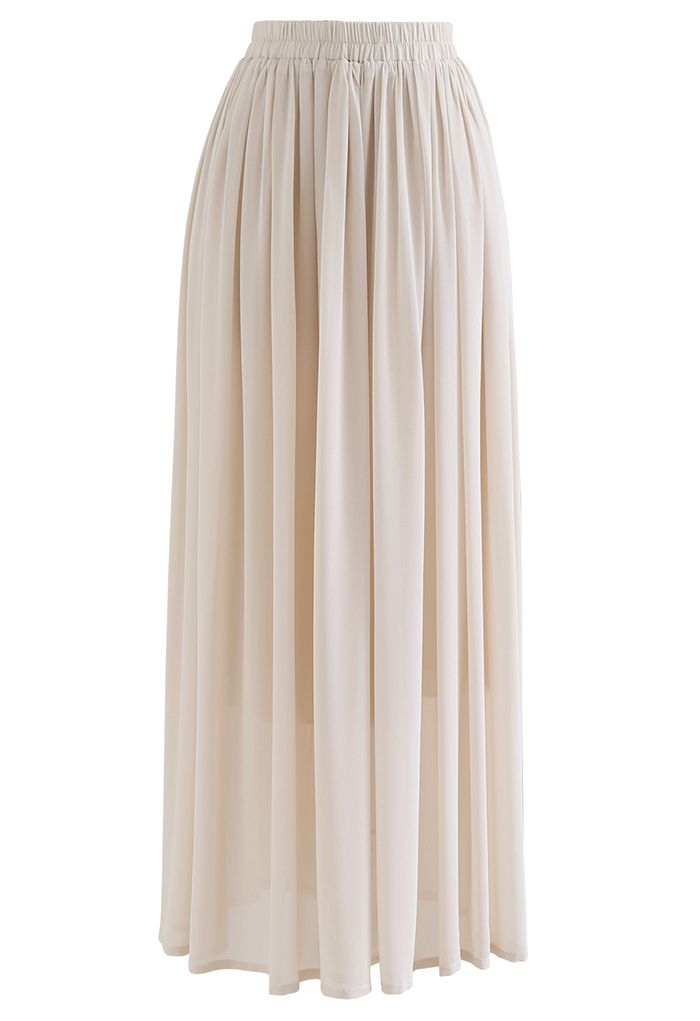 Front view of a nude chiffon maxi skirt with a flowy, romantic design and an elastic waistband.