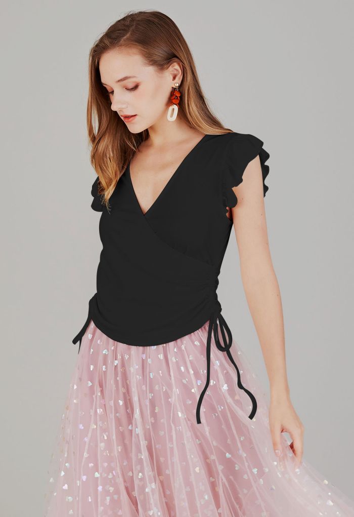Drawstring Faux-Wrap Ruffle Sleeveless Top in Black