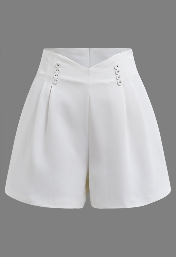 Button-Embellished Dipped Front Waist Shorts in White