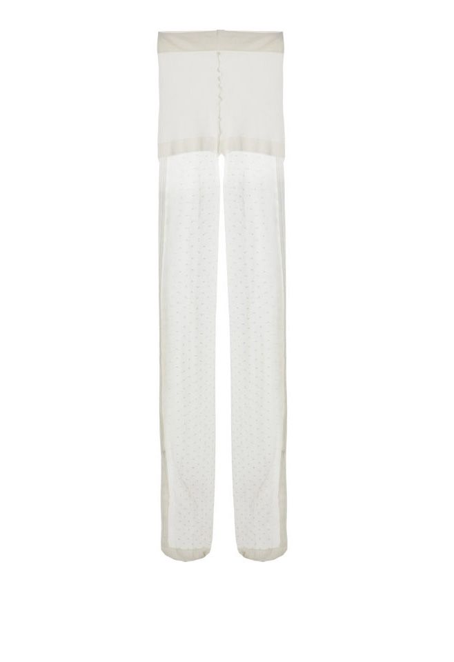 Back view of French romantic tights showcasing a subtle polka dot design and elegant lace trim.