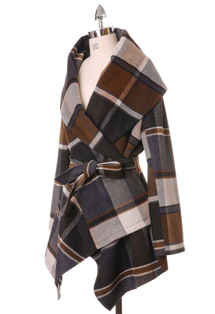 Side view of the Prairie Check Rabato Coat on a mannequin, displaying the large plaid pattern and stylish belted waist.