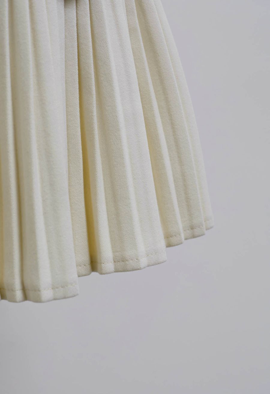 Golden Button Decorated Pleated Mini Skirt in Ivory
