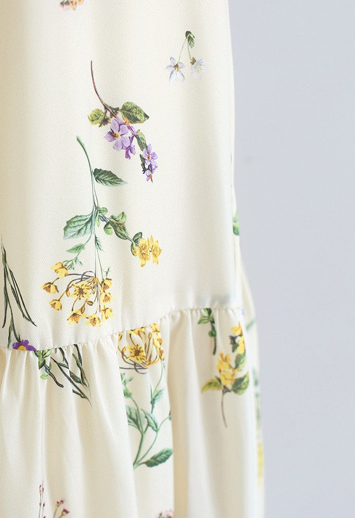 Close-up of the fabric, displaying the delicate wild flower print on a light background.