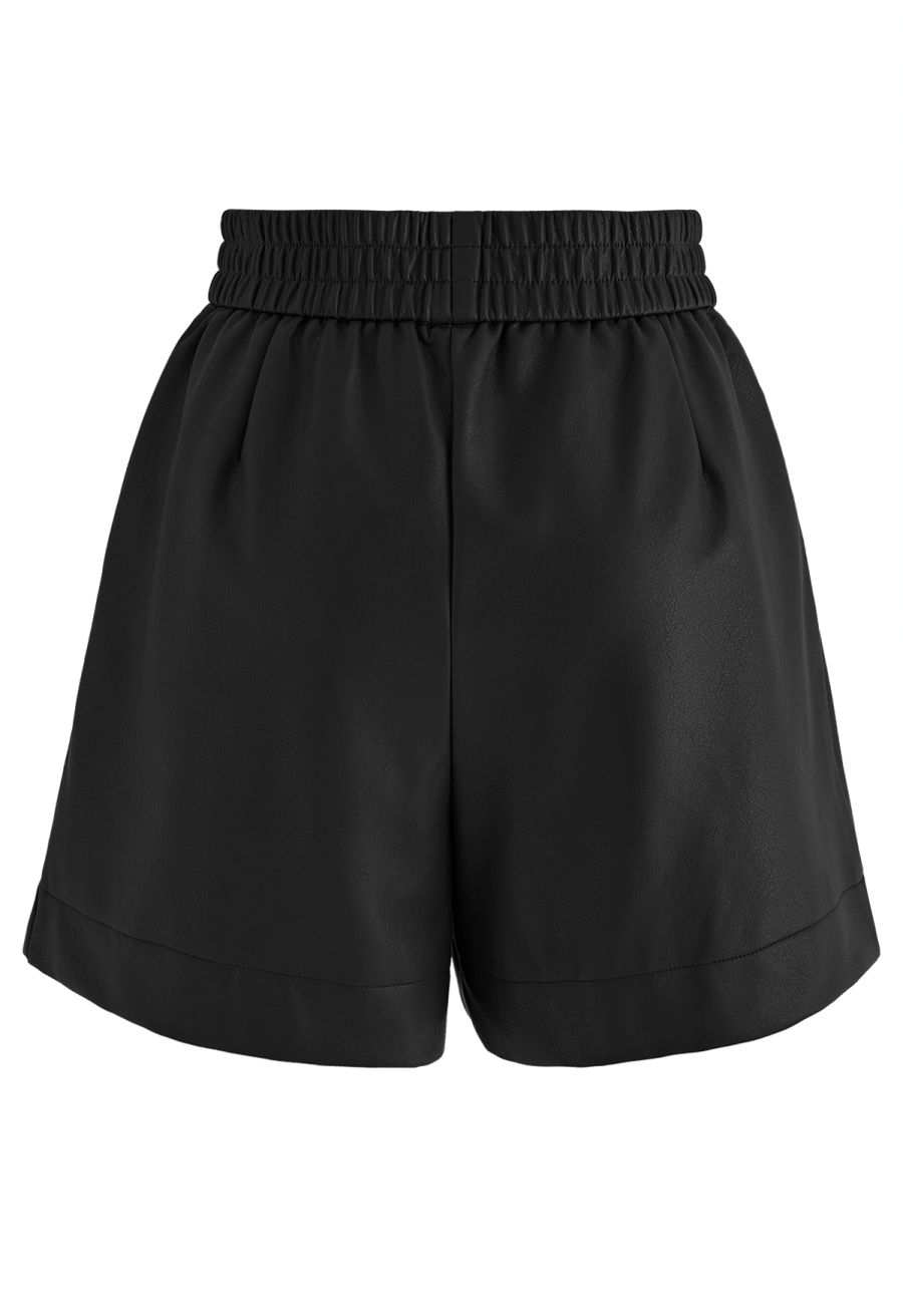 Textured Buttoned Faux Leather Shorts in Black