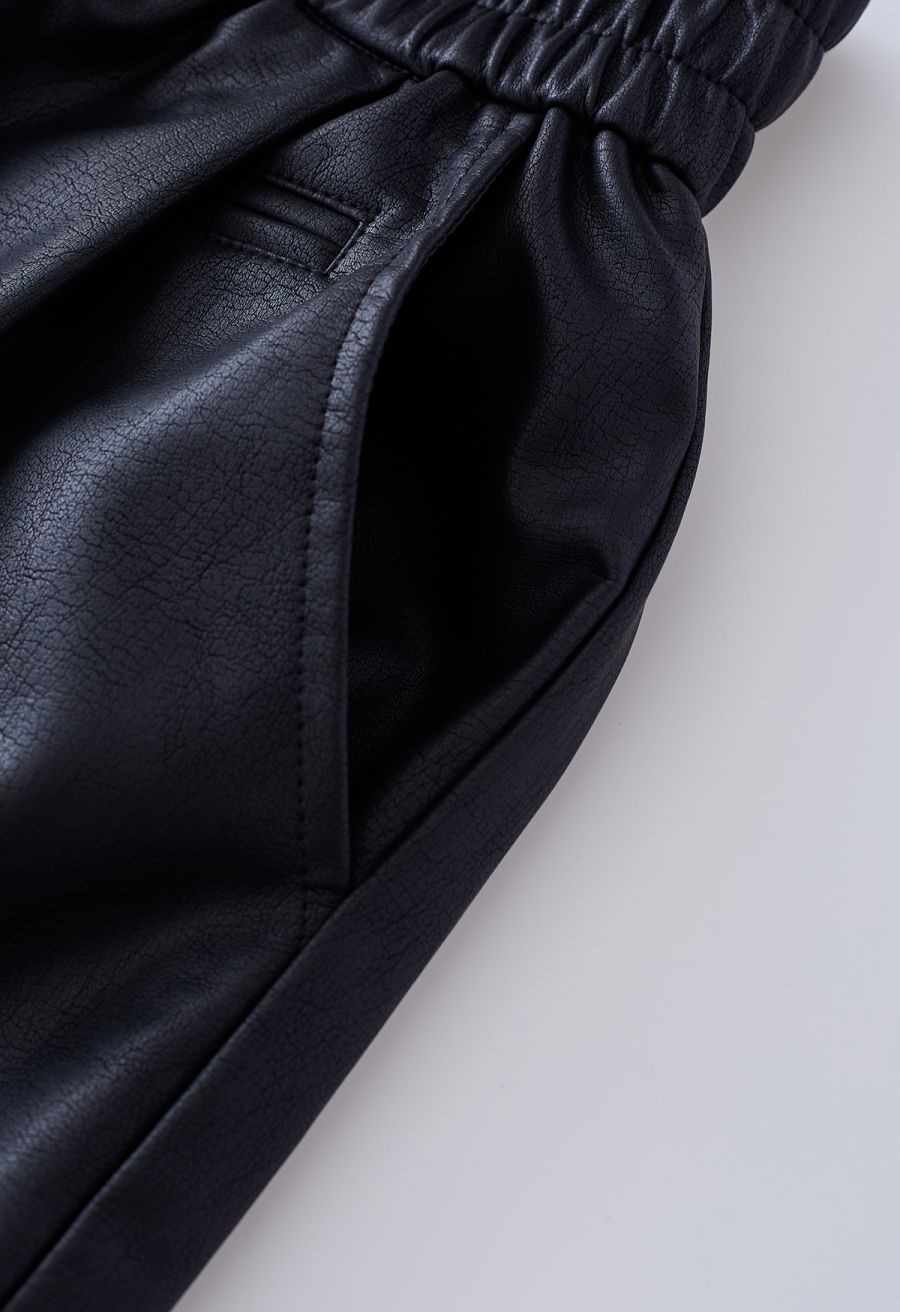 Textured Buttoned Faux Leather Shorts in Black