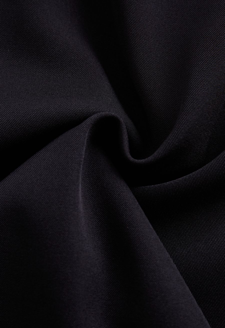 Buttoned Pleated A-Line Skirt in Black