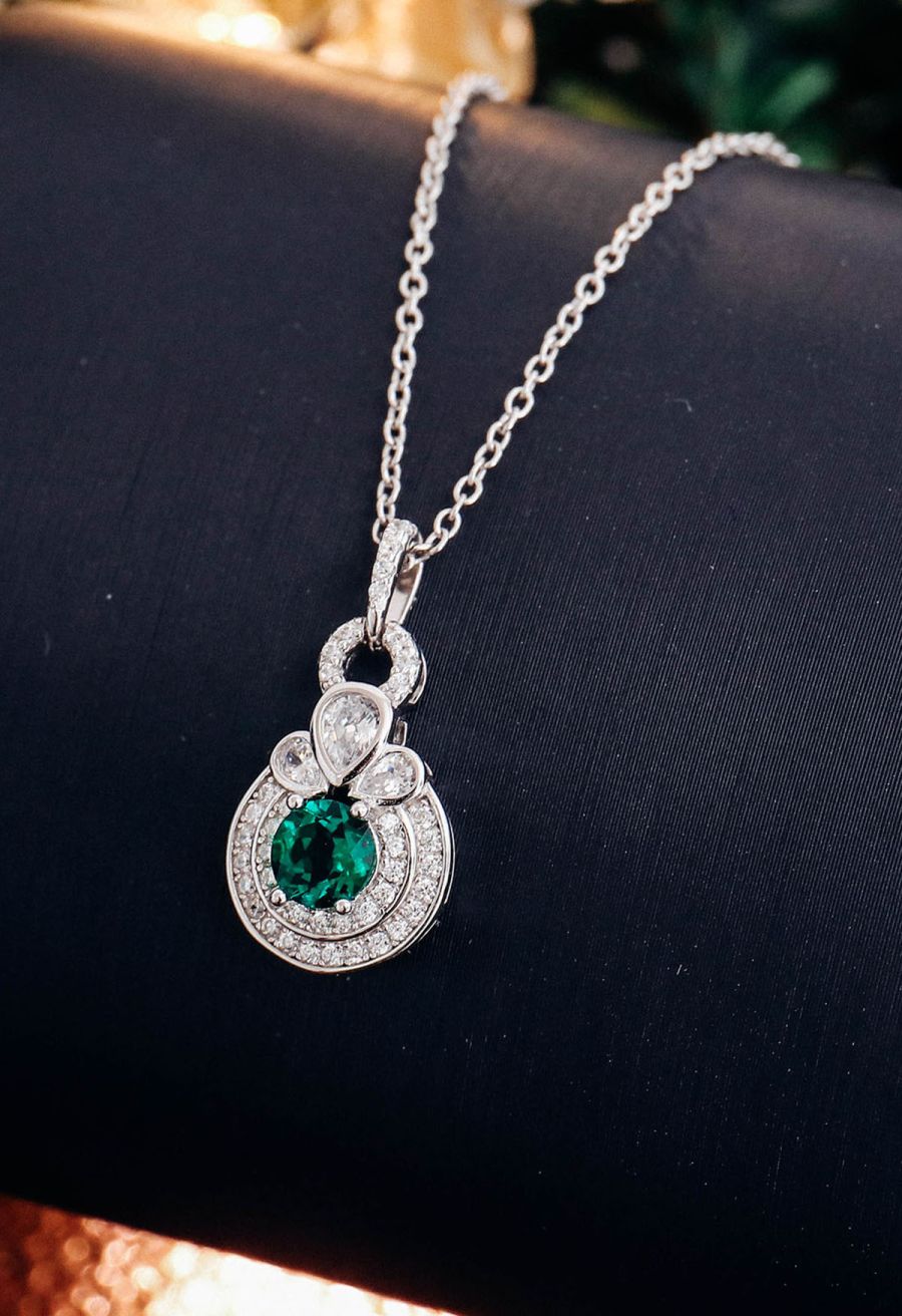 Rounded Halo Emerald Diamond Necklace