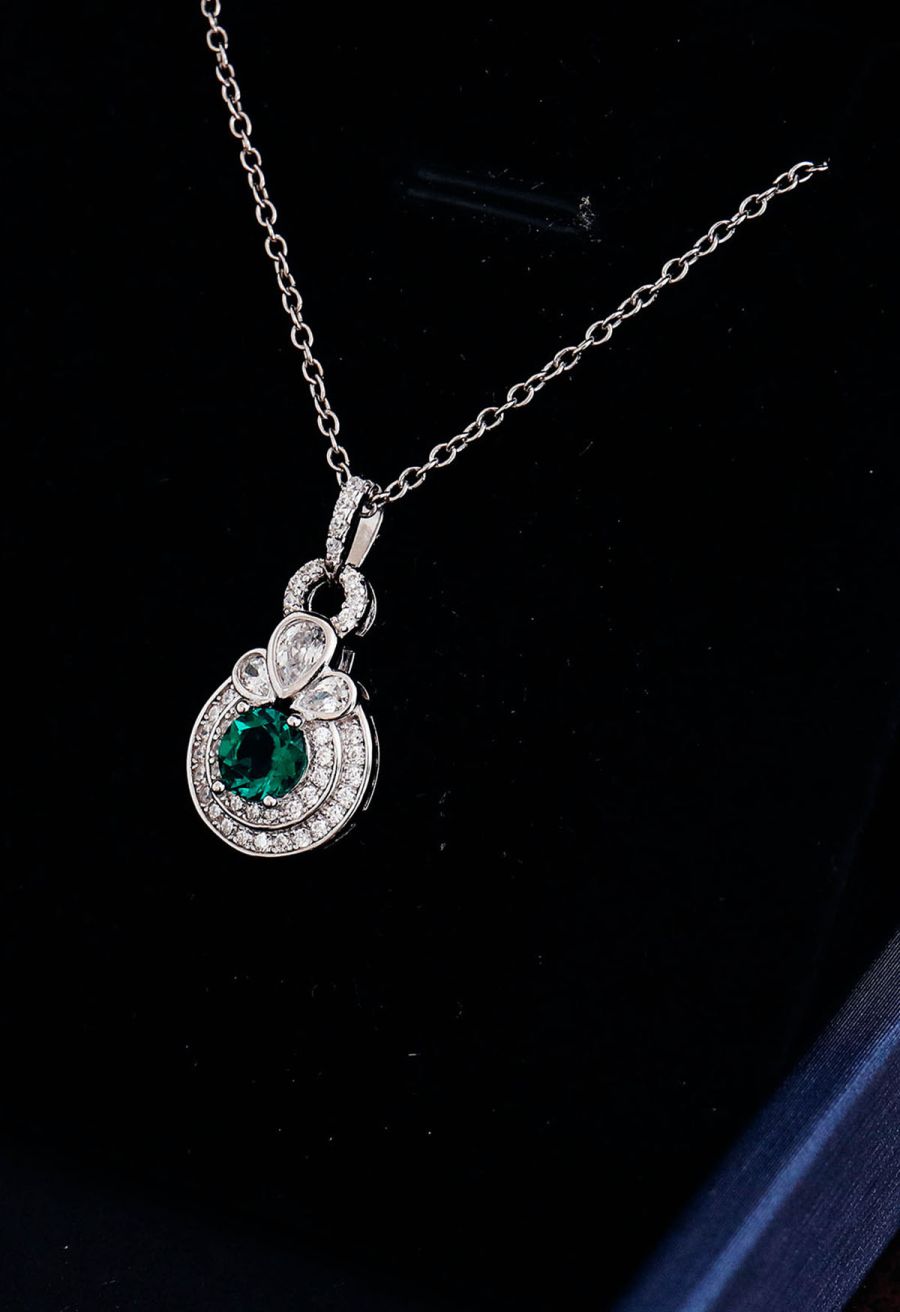 Rounded Halo Emerald Diamond Necklace