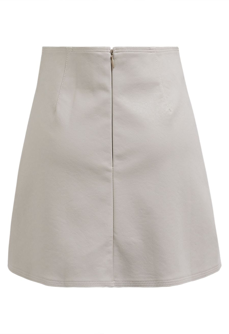 Button Trimmed Faux Leather Mini Skirt in Ivory