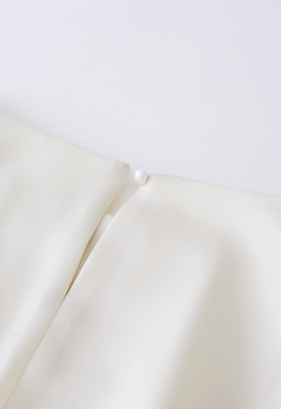 Padded Shoulder Cowl Neck Ruched Satin Dress in Cream