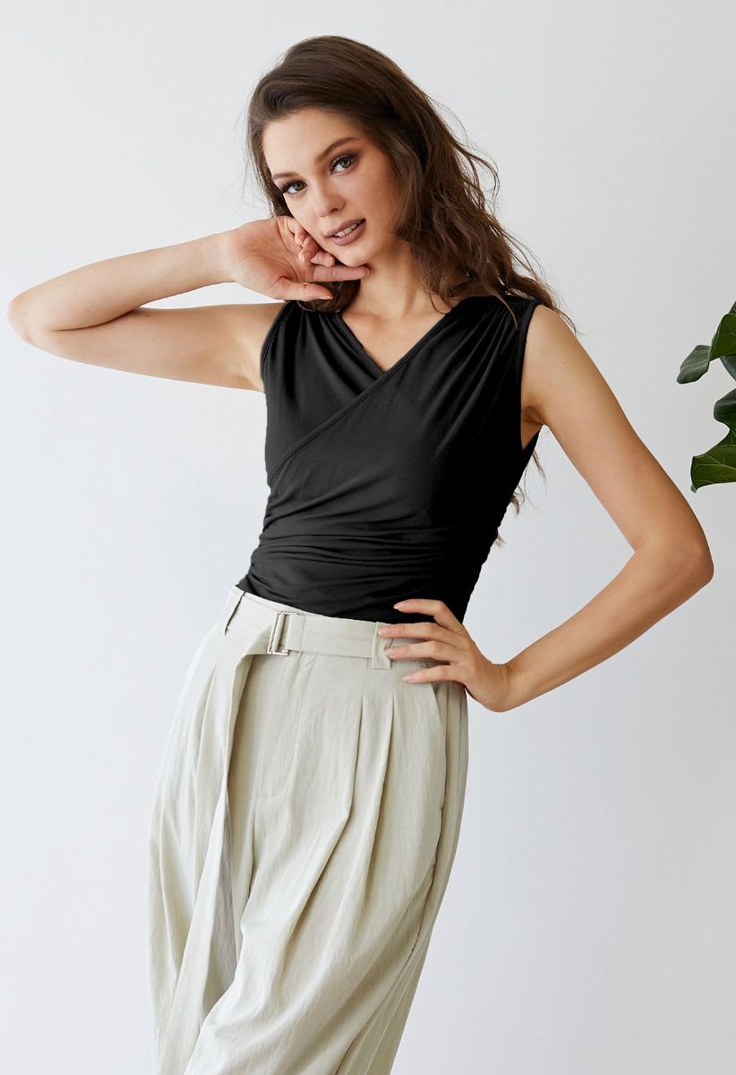 Faux-Wrap Ruched Sleeveless Top in Black