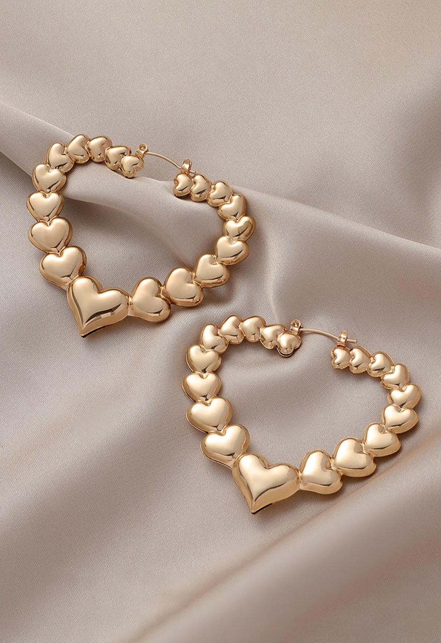 Hollow Out Metal Heart Earrings in Gold