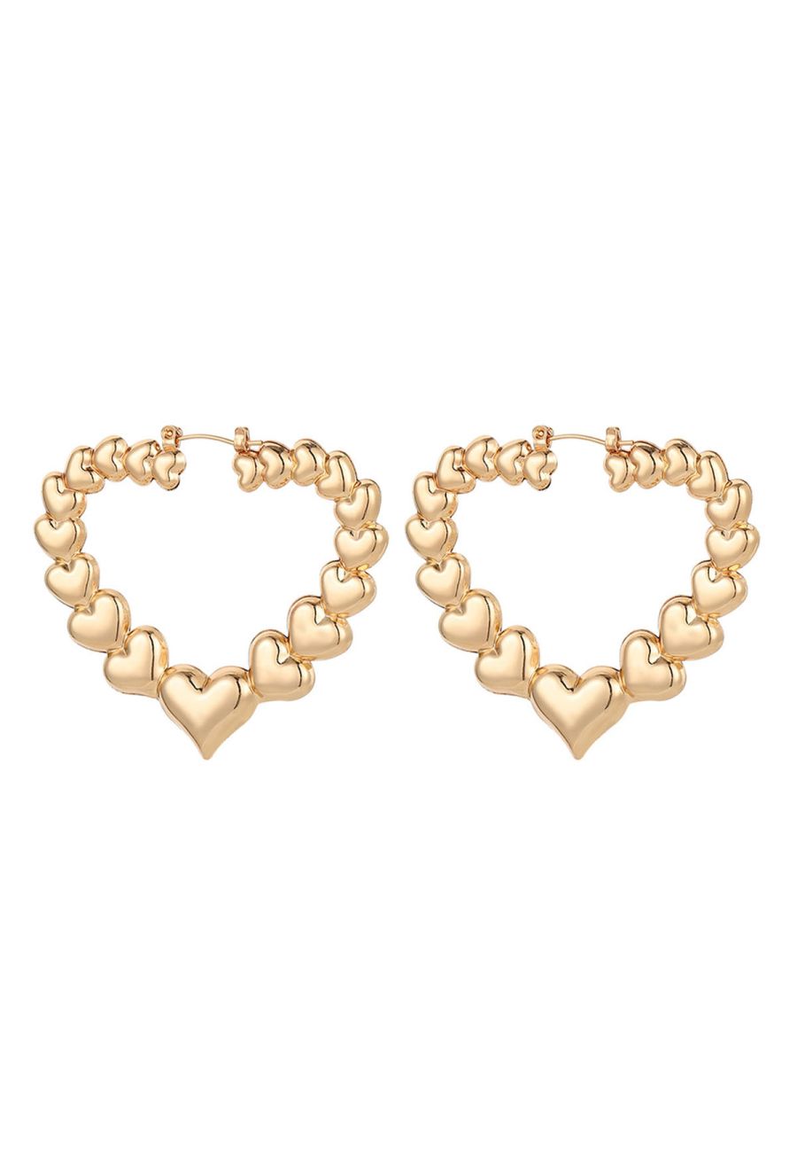 Hollow Out Metal Heart Earrings in Gold