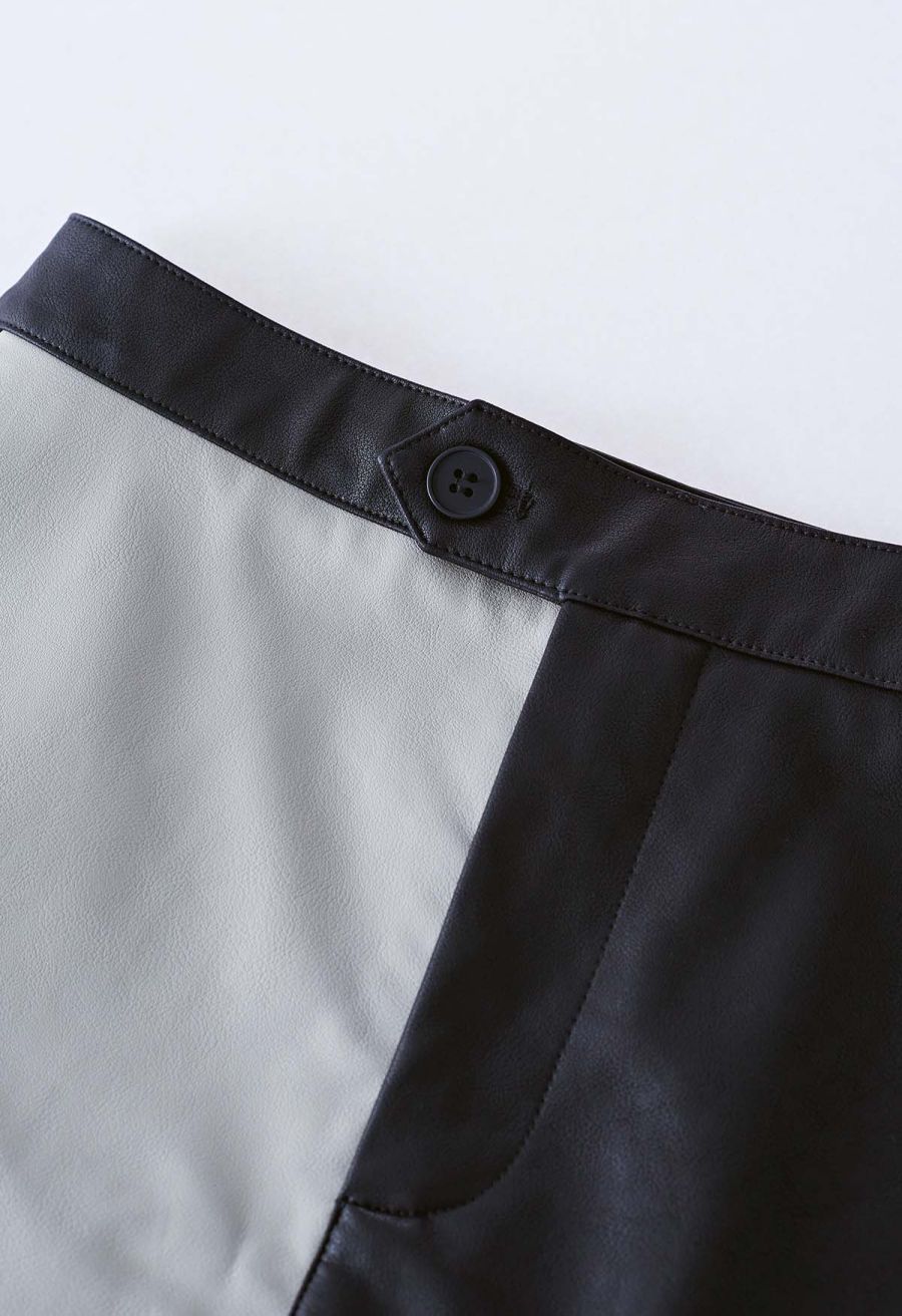 Two-Tone Faux Leather Mini Bud Skirt in Black