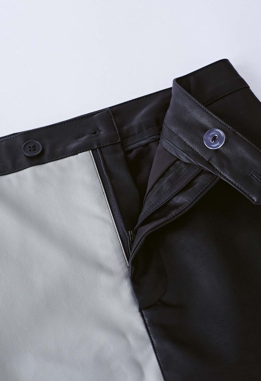 Two-Tone Faux Leather Mini Bud Skirt in Black