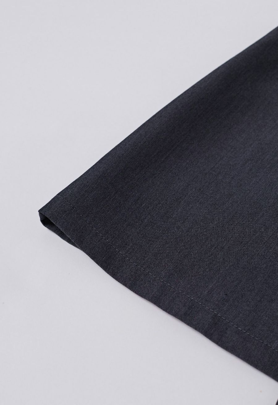 Asymmetric Buttoned Flap Mini Skirt in Smoke