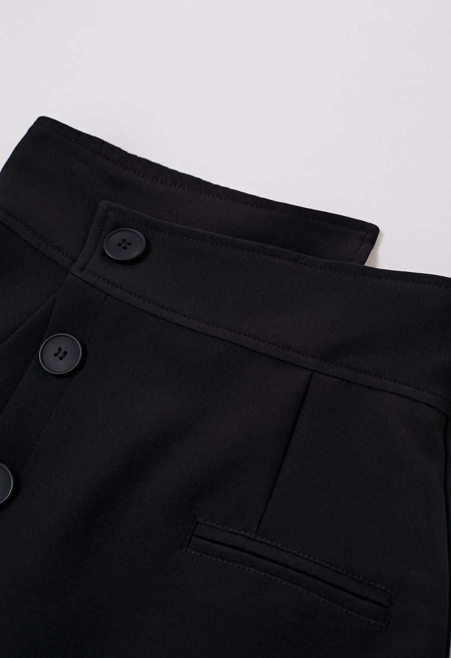 Asymmetric Buttoned Flap Mini Skirt in Black