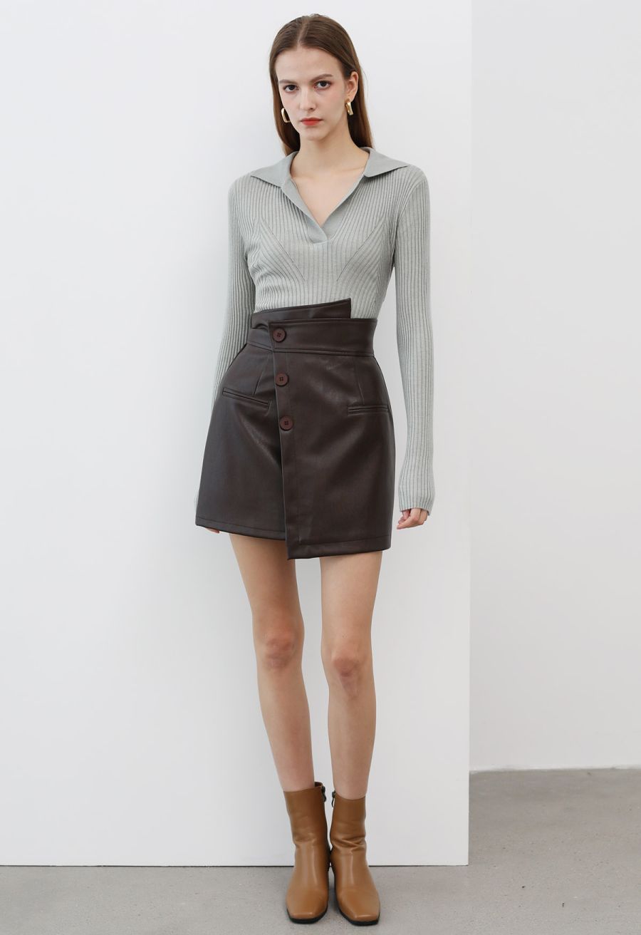 Faux Leather Asymmetric Buttoned Flap Mini Skirt in Brown