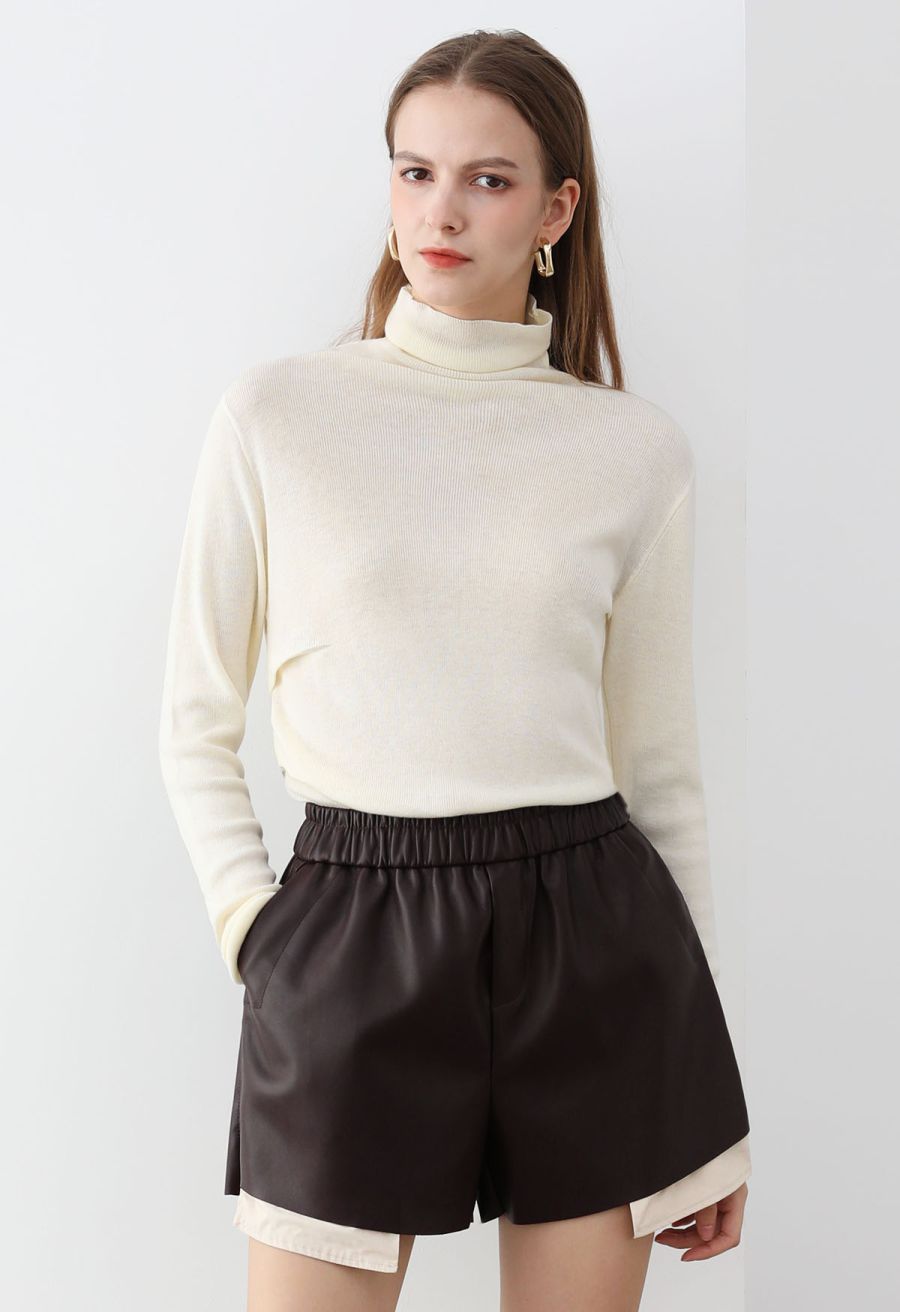 Side Pleat High Neck Ribbed Knit Top in Cream