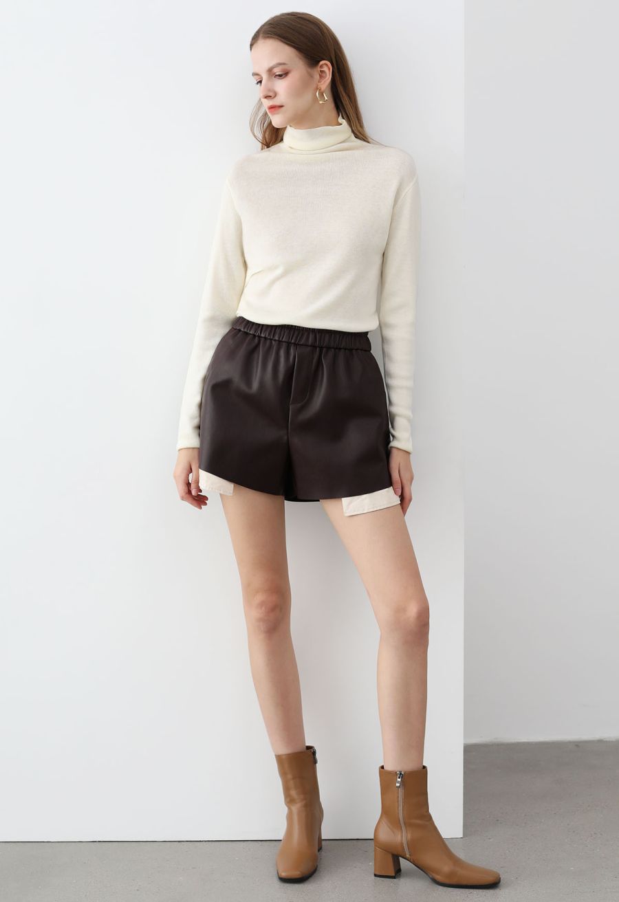 Side Pleat High Neck Ribbed Knit Top in Cream