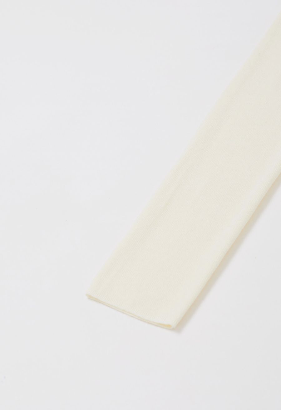Side Pleat High Neck Ribbed Knit Top in Cream
