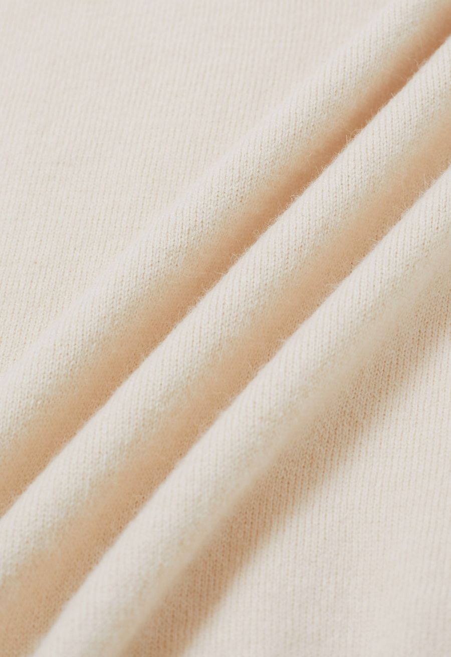 V-Neck Sleeveless Knit Top and Pleated Skirt Set in Cream