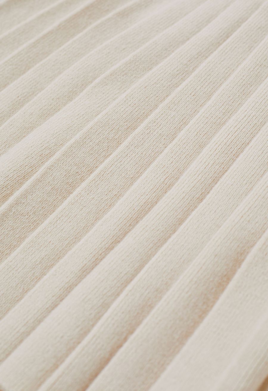 V-Neck Sleeveless Knit Top and Pleated Skirt Set in Cream