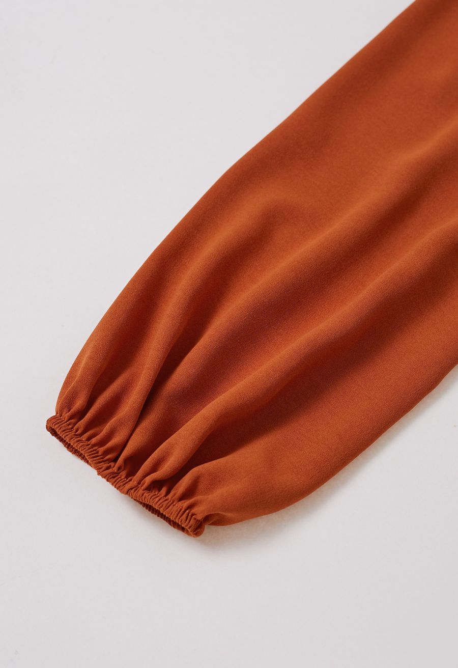 Sash Adorned Wide Leg Pleated Jumpsuit in Orange