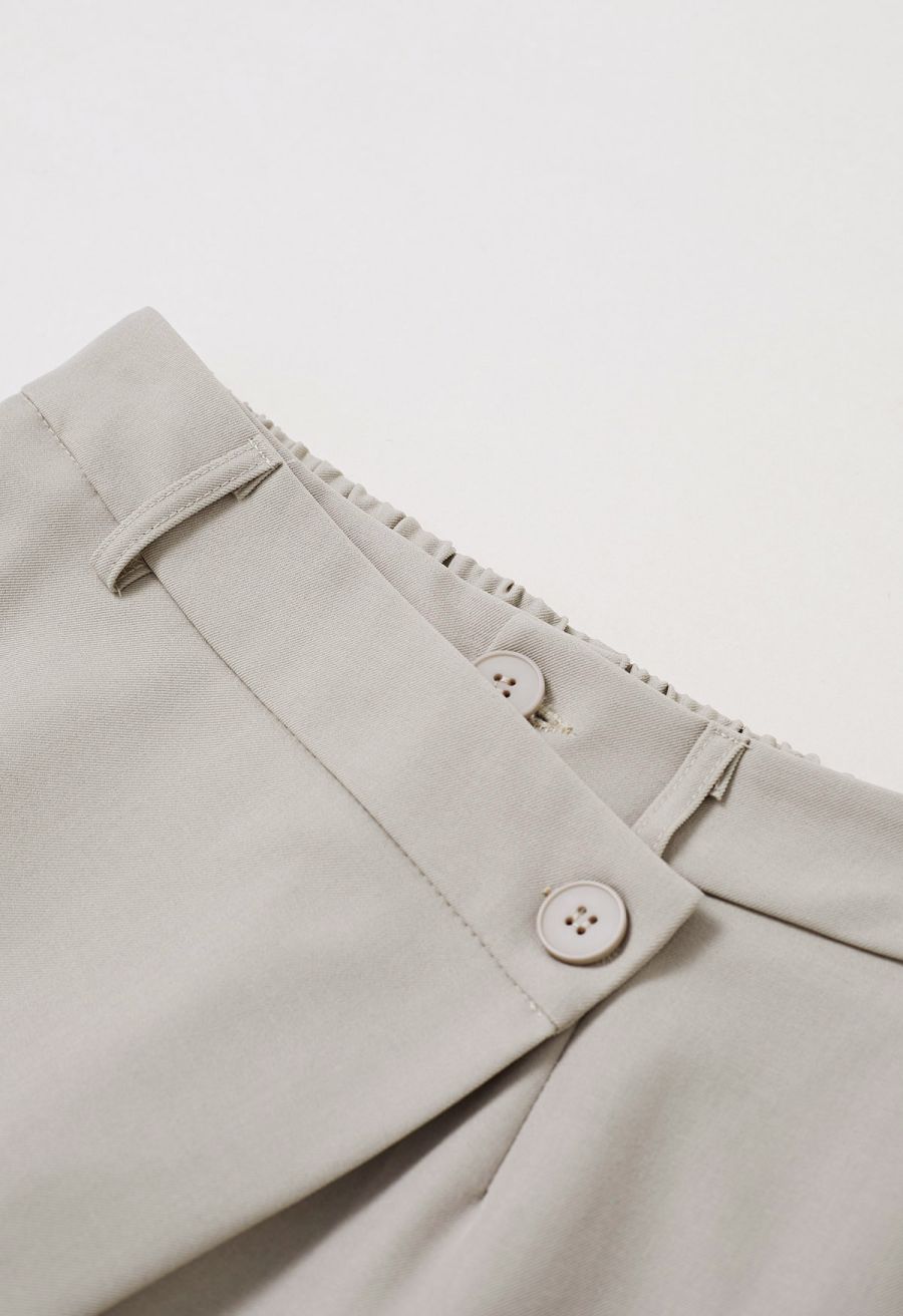 Asymmetric Flap Buttoned Straight-Leg Pants in Linen