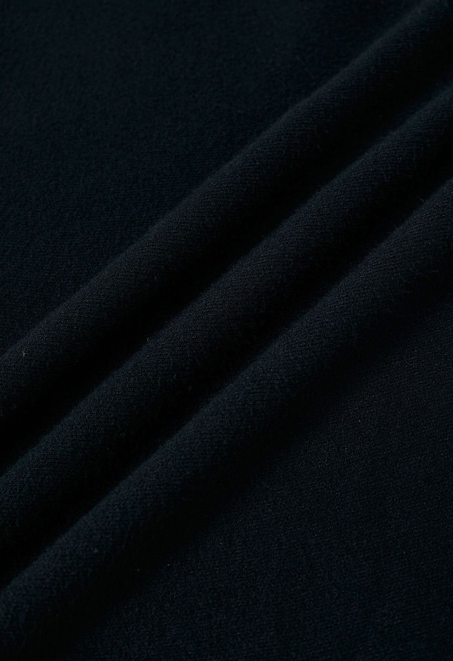 Solid Color A-Line Knit Midi Skirt in Black