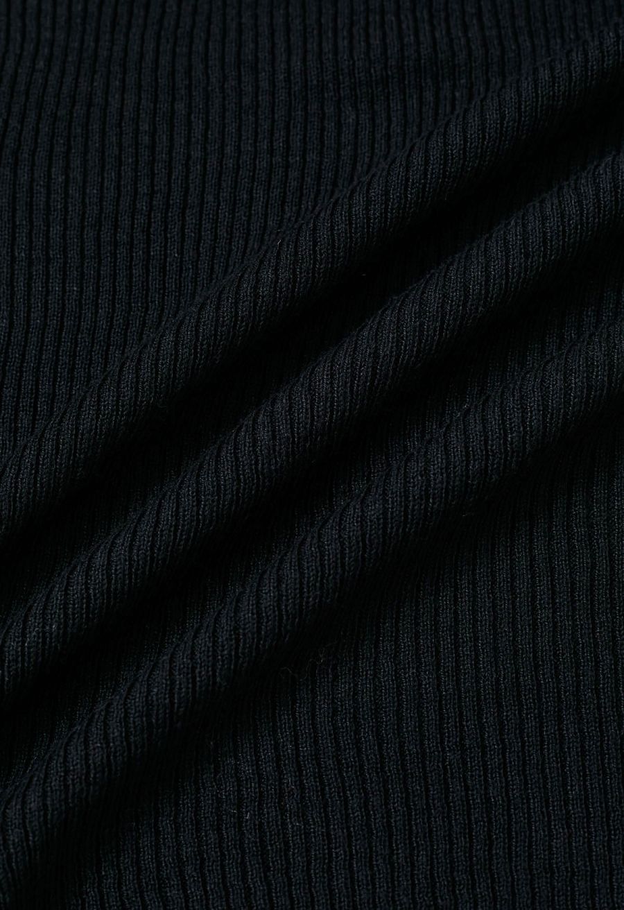 Soft Elegance Off-Shoulder Flap Knit Top in Black