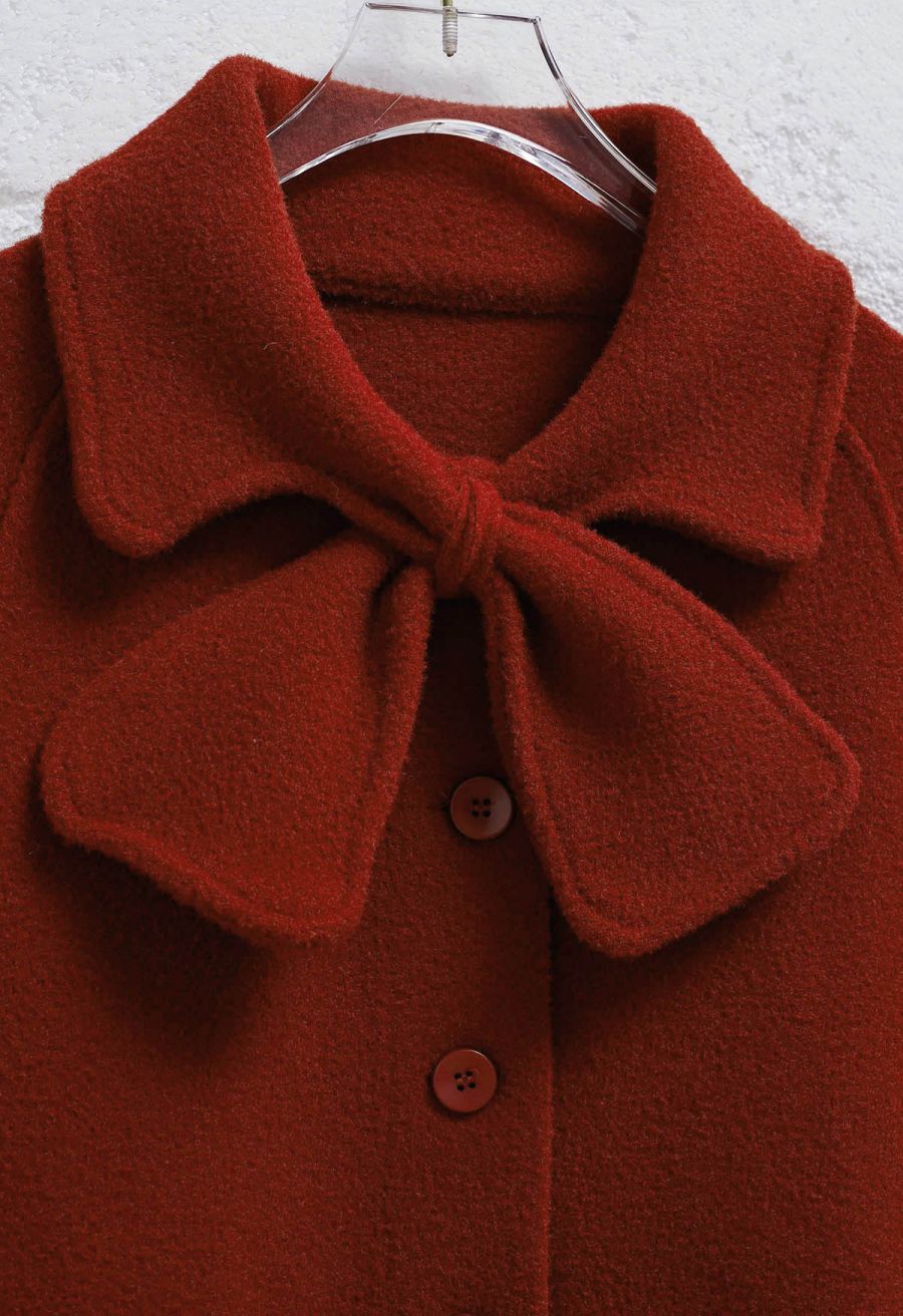 Bowknot Decor Faux Fur Pocket Buttoned Knit Cape Coat in Red