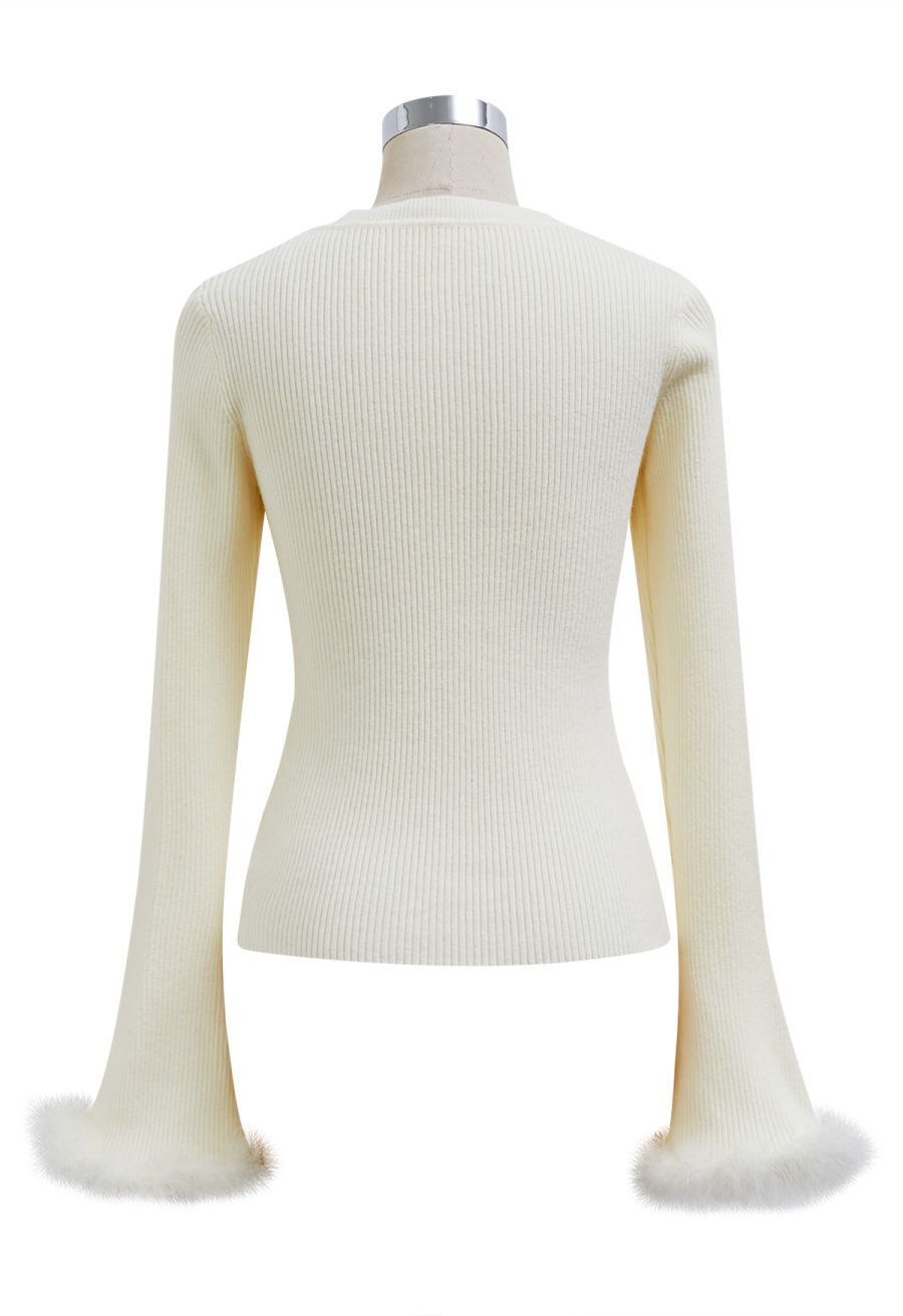 Feather Trim Cuff Golden Button Knit Top in Cream