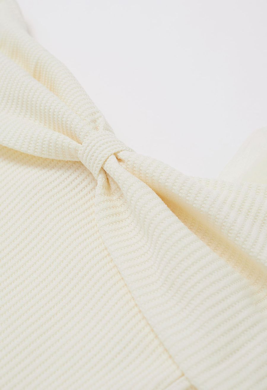 Mesh One-Shoulder Bowknot Ribbed Crop Top in Cream