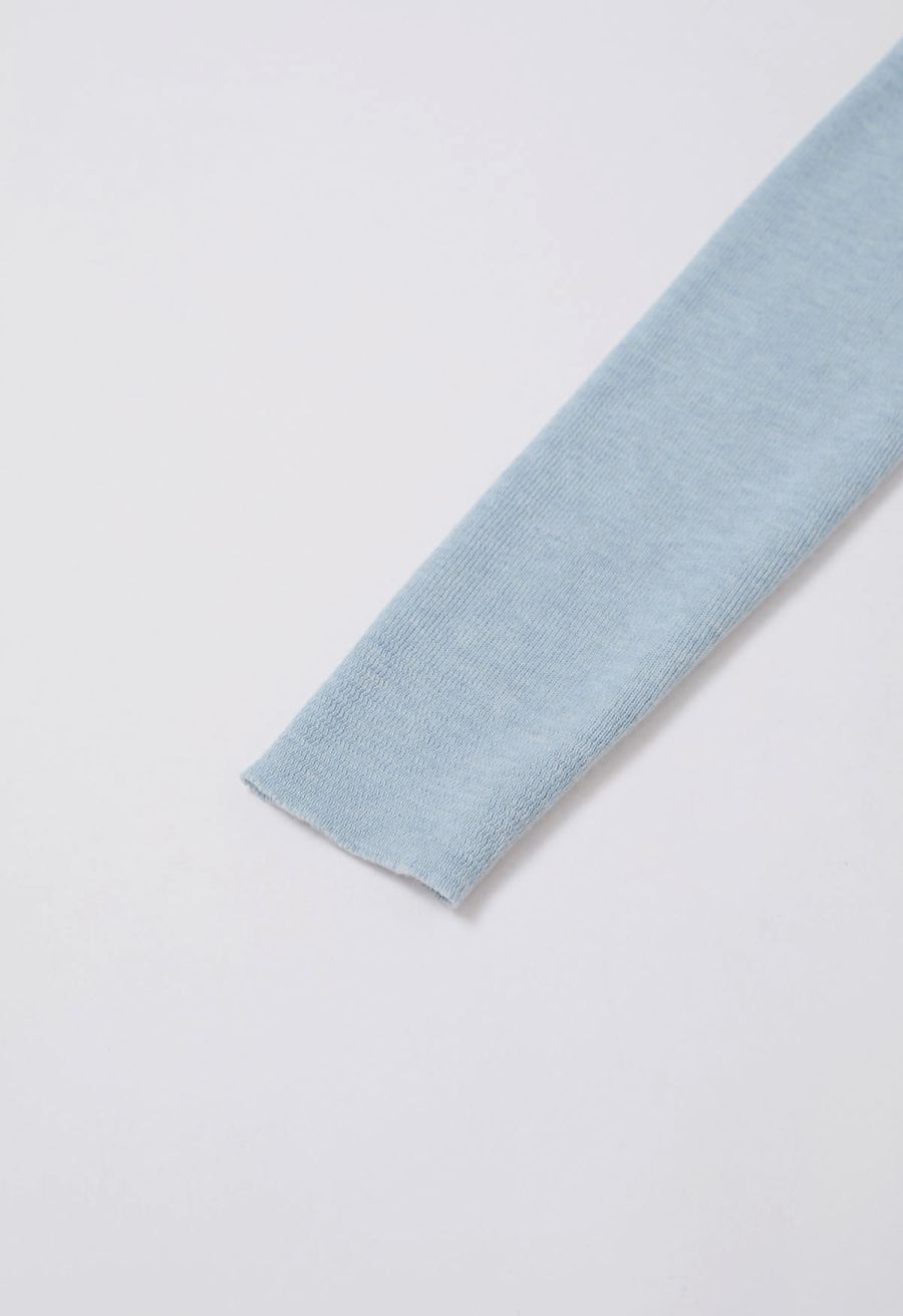Sweet Ease Mesh Shoulder Flap Knit Top in Light Blue