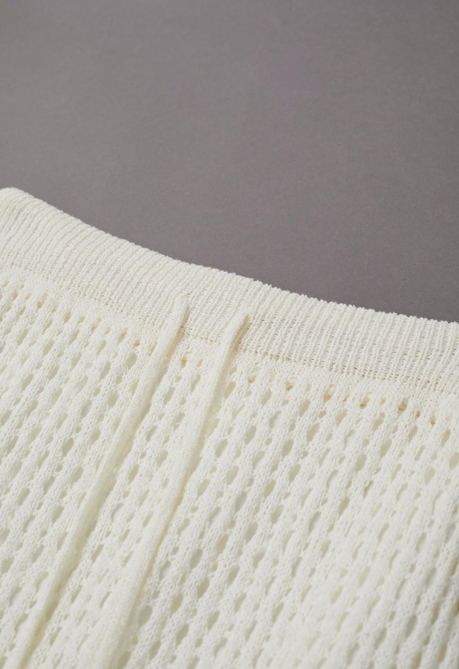 Hollow Out Rolled Hemline Drawstring Knit Maxi Skirt in Ivory
