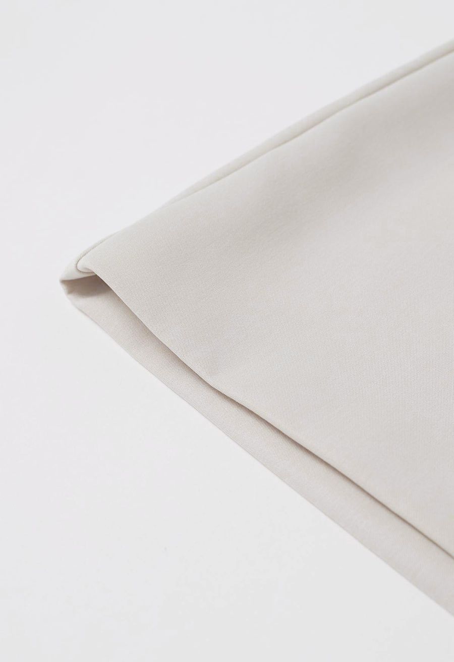 Golden V-Shape Metal Decor Belted Shorts in Ivory