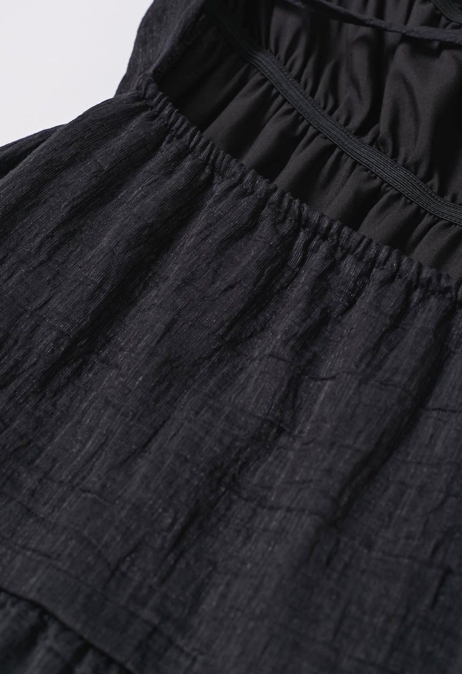 Tie-Back Crinkled Tiered Halter Dress in Black