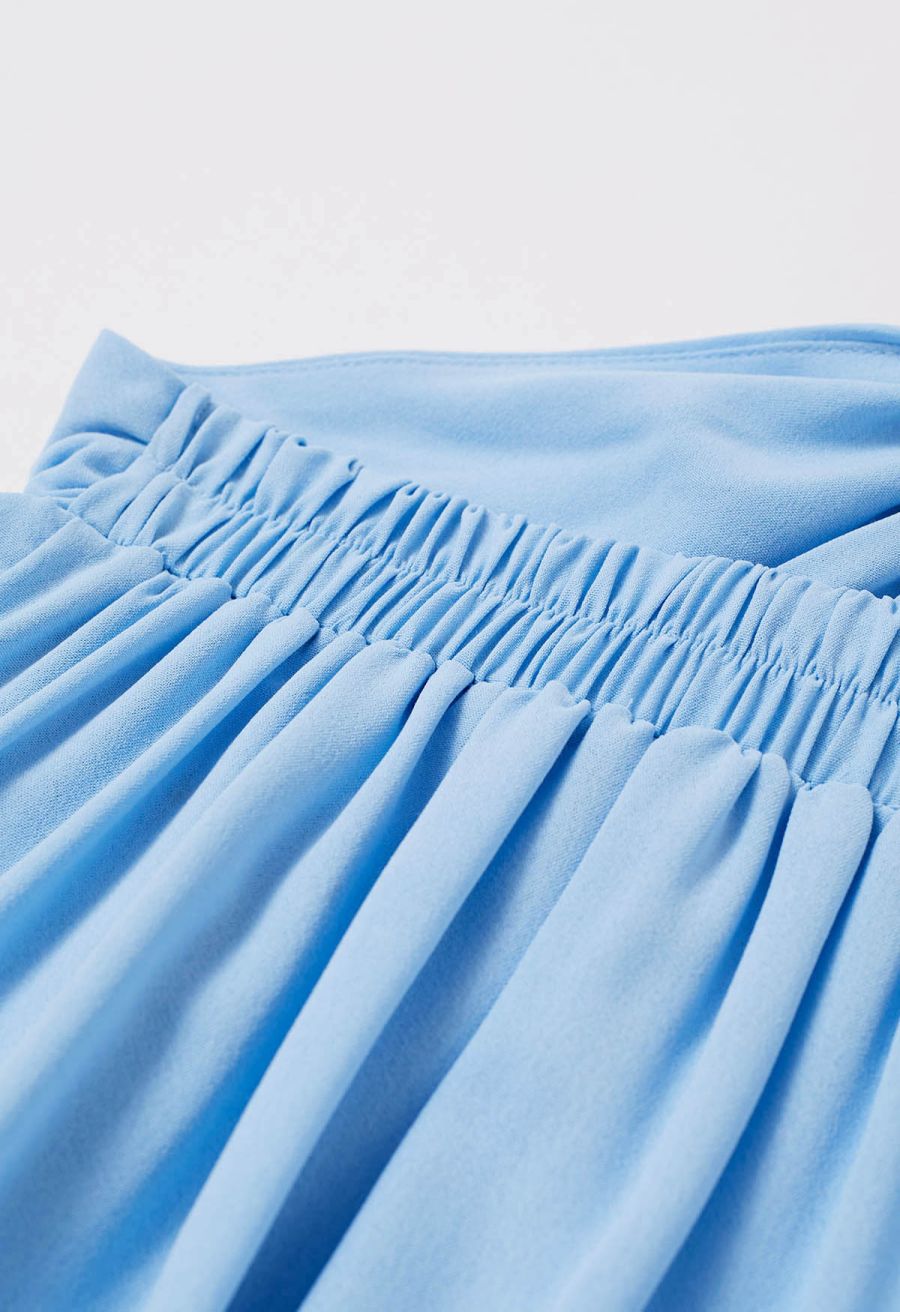 Cascade Ruffle O-Ring Tie-Back Maxi Dress in Blue