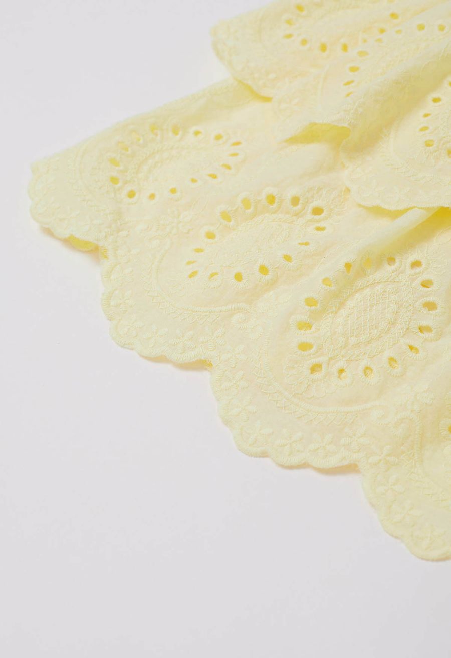 Embroidered Eyelet Cotton Layered Mini Skirt in Yellow