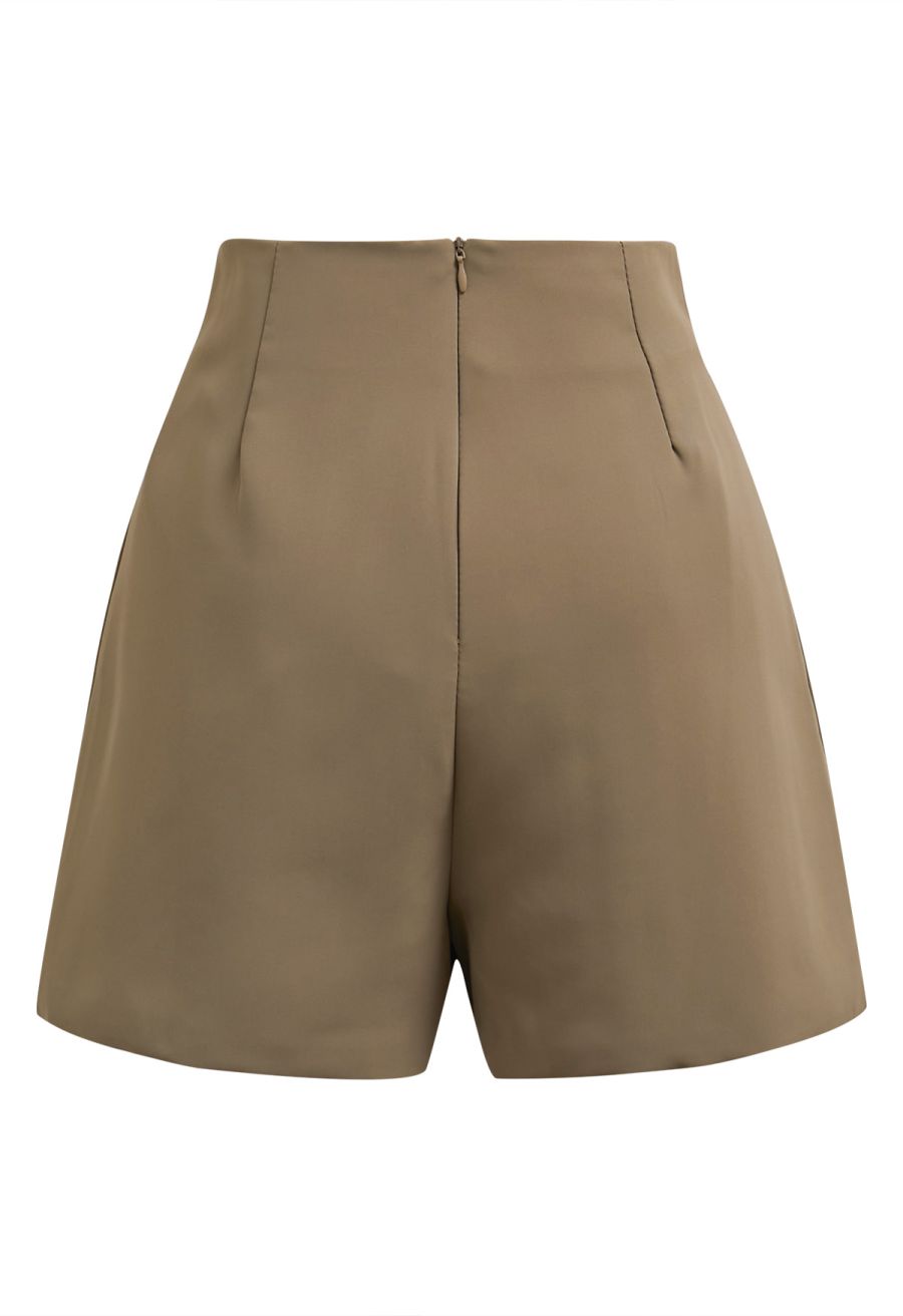 Button-Embellished Dipped Front Waist Shorts in Brown