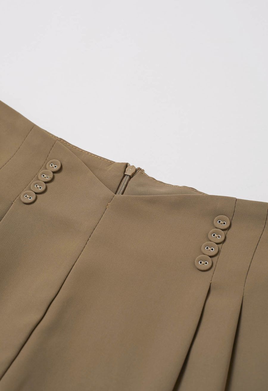 Button-Embellished Dipped Front Waist Shorts in Brown