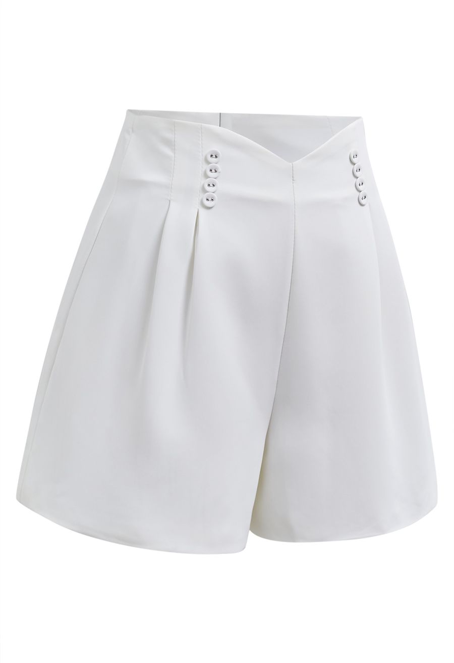 Button-Embellished Dipped Front Waist Shorts in White