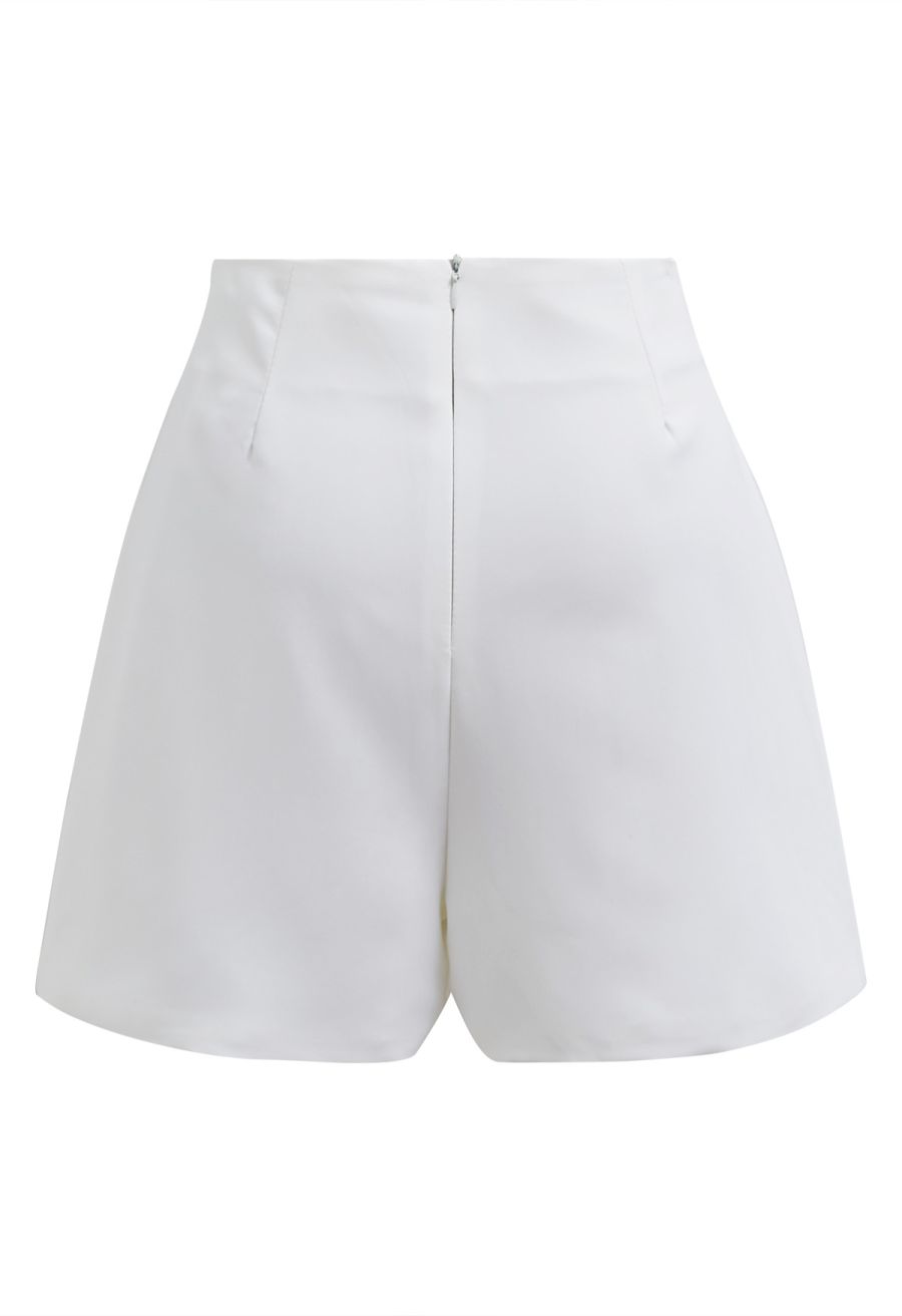 Button-Embellished Dipped Front Waist Shorts in White