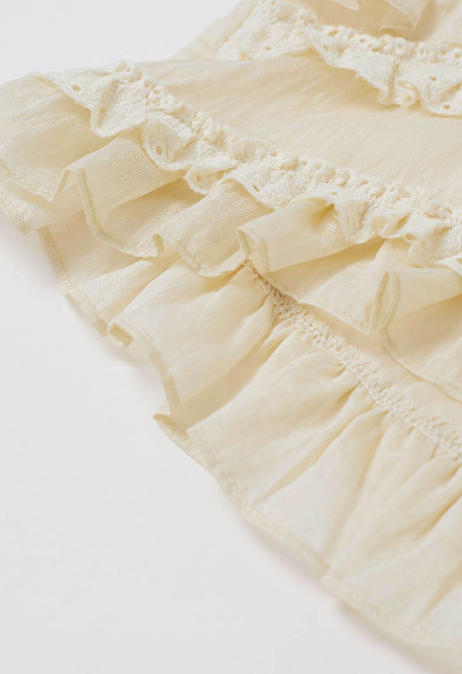 Ruffle Button-Front Semi-Sheer Sleeveless Top