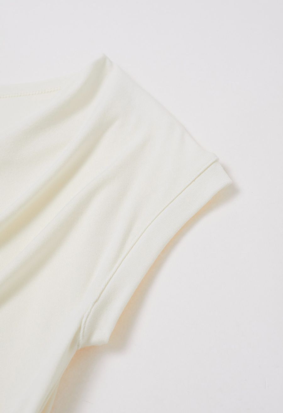 Cowl Neck Buttoned Asymmetric Hem Top in Cream