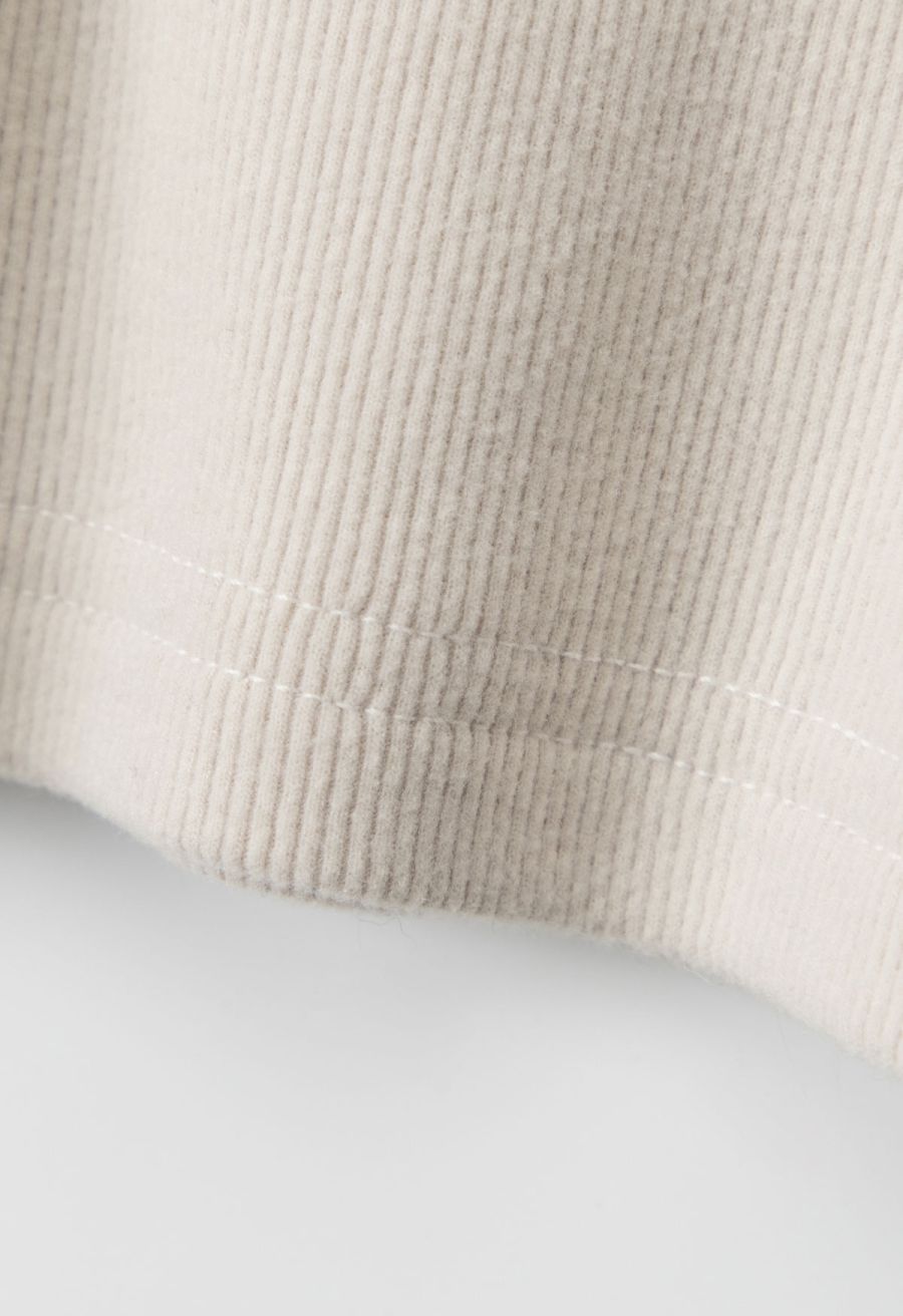 Fuzzy Plunge V-Neck Fitted Top in Ivory