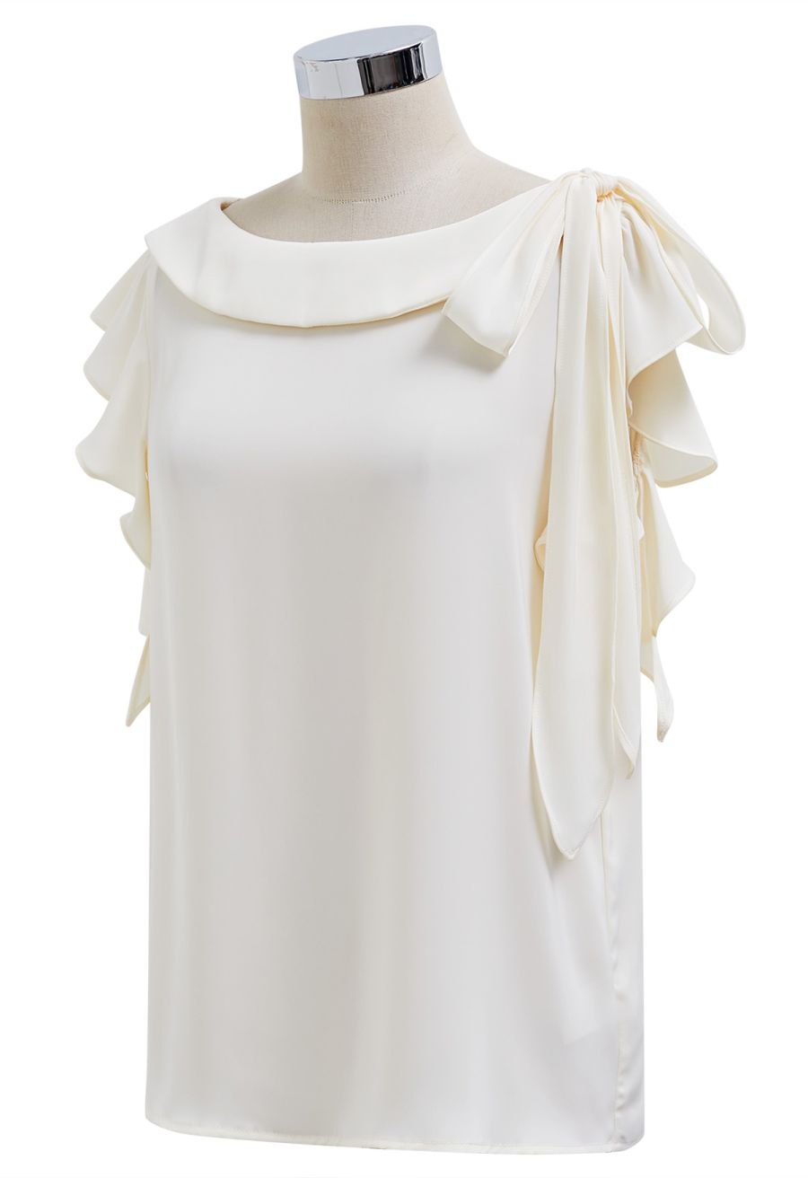 Side Knot Ruffle Sleeveless Satin Top in Cream