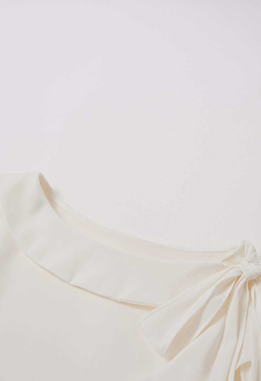 Side Knot Ruffle Sleeveless Satin Top in Cream